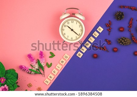 Spring and winter flay lay, change of season of the year concept, creative background with copy space photo
