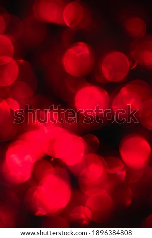 red festive background with bokeh, vertical photo closeup