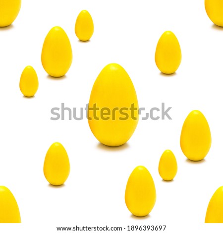 Seamless pattern of yellow Easter eggs of different shapes on a white background. Isolate, side view.