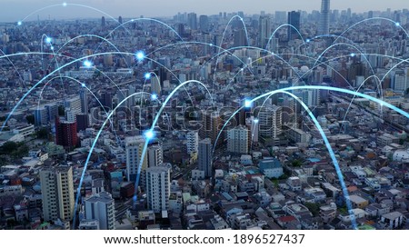 Smart city and communication network. Digital transformation. IoT (Internet of Things). ICT (Information Communication Technology). Royalty-Free Stock Photo #1896527437