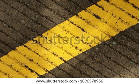 Grunge Roadway Surface with Yellow Line Sign Texture - Diagonal