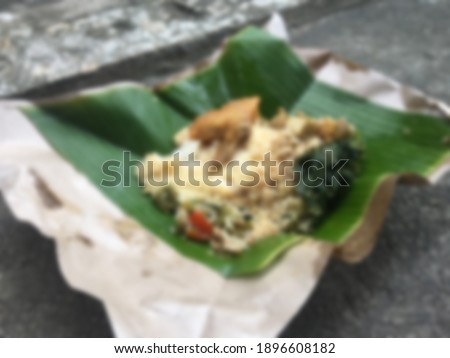 blurred nasi padang or padang rice mix with chicken kentuchy 