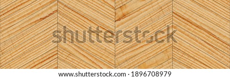 Seamless wooden background. Rough untreated parquet floor with chevron pattern. Hardwood planks texture.