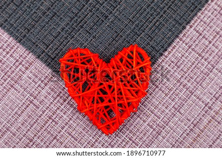 Two red hearts on a black and pink background. Valentine's Day. Place for your text.