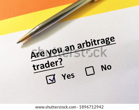 One person is answering question about trading. He is an arbitrage trader. Royalty-Free Stock Photo #1896712942
