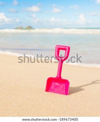 Beach toy in the sand, Hawaii, USA.