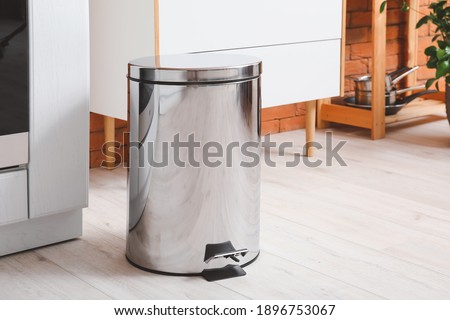 Clean trash bin in modern kitchen Royalty-Free Stock Photo #1896753067