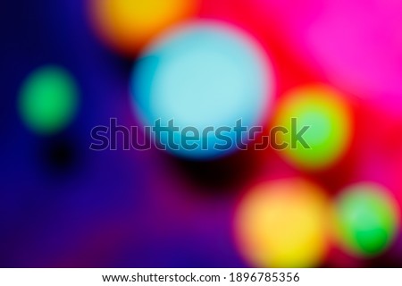 Blurred, out of focus photo, intense bokeh, vivid colors sci-fi atmosphere. Amazing wallpaper backdrop. Colorful light points. Royalty-Free Stock Photo #1896785356