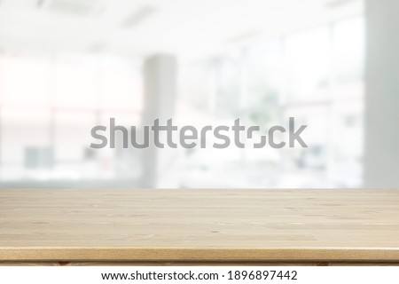 Empty Wood table on blur kitchen window background for panoramic banner