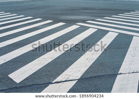 crossroad with white line sign