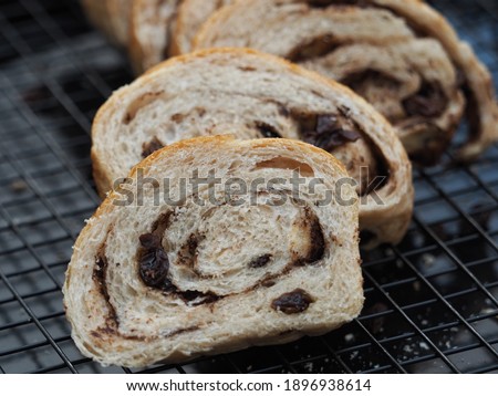 Homemade bread loaf with chocolate and raisins