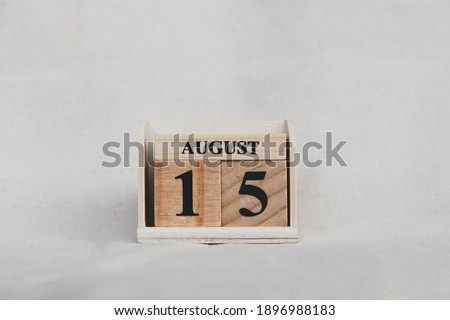 August 15th. Image of August 15 wooden color calendar on white canvas background. empty space for text