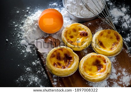 Egg tart, crispy crunchy pie crust with a smooth, burnt egg filling