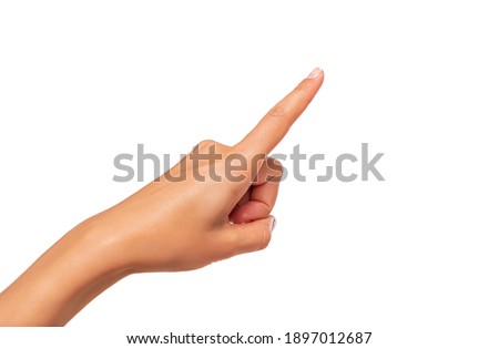 Female hand points a finger isolated on white background. Royalty-Free Stock Photo #1897012687