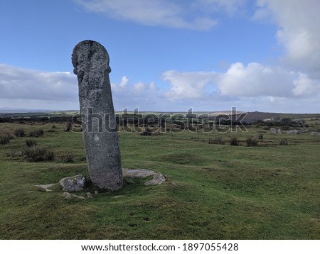 The Medieval Long Tom Cross and the extraordinary view behind it, near Minions on Bodmin Moor in East Cornwall.