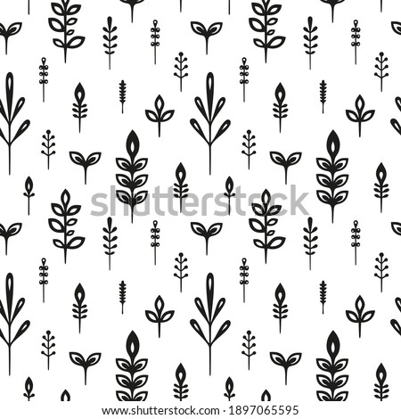 Drawing of leaves. Black and white 
 background. Seamless pattern. Vector graphics.
