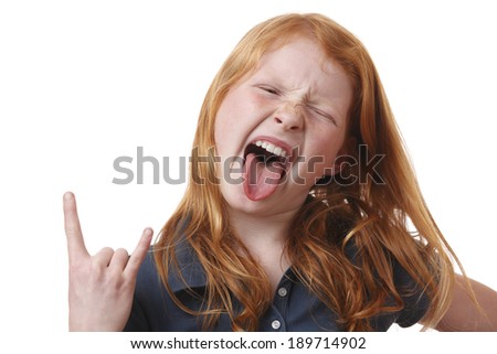 Portrait on an angry young girl on white background