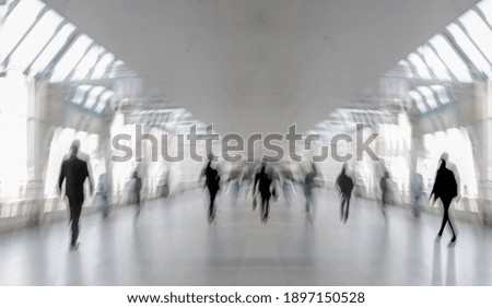 Abstract image of people in the lobby of the modern transport center of the airport bus and train station