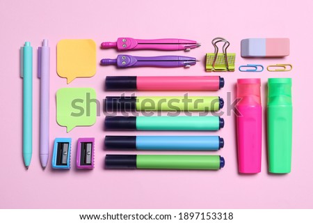 Different school stationery on pink background, flat lay