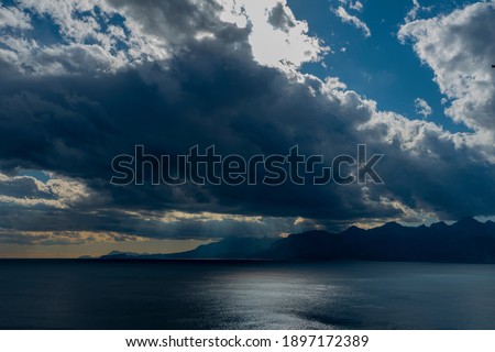 
sky before the storm and rain in the mediterranean
