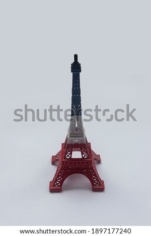 Dusty furniture of eiffel tower with white background. Selective Focus