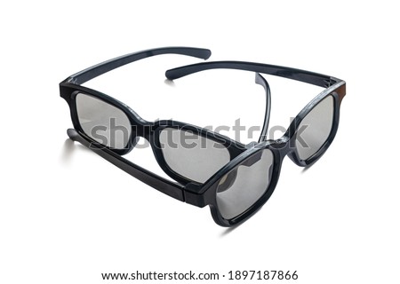Dark plastic 3D glasses for watching movies and TV shows, isolated on a white background