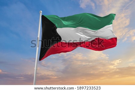Large Kuwait flag waving in the wind Royalty-Free Stock Photo #1897233523