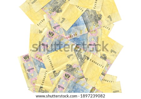 1 Ukrainian hryvnia bills flying down isolated on white. Many banknotes falling with white copy space on left and right side