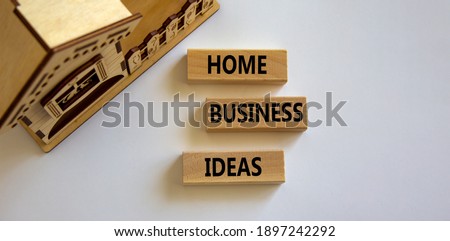 Home business ideas symbol. Wooden blocks form the words 'Home business ideas' near miniature house on beautiful white background. Business, home business ideas concept. Copy space.