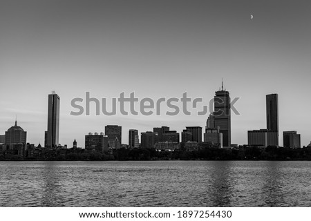 The moon over the Boston cityscape
