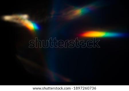 Abstract blurred background of colorful lens flare bokeh. Royalty-Free Stock Photo #1897260736