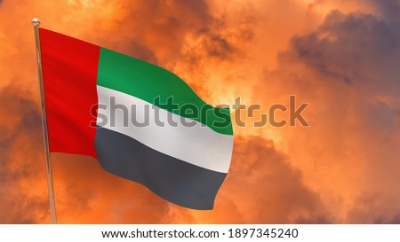 United arab emirates flag on pole. Dramatic background. National flag of United arab