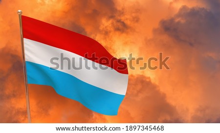 luxembourg flag on pole. Dramatic background. National flag of luxembourg