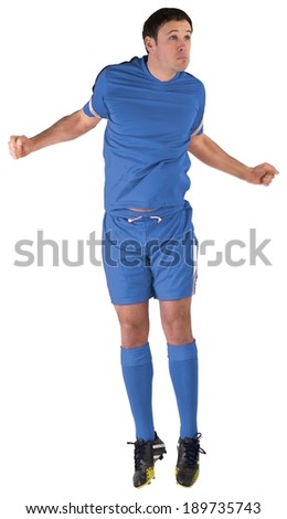 Football player in blue jumping on white background