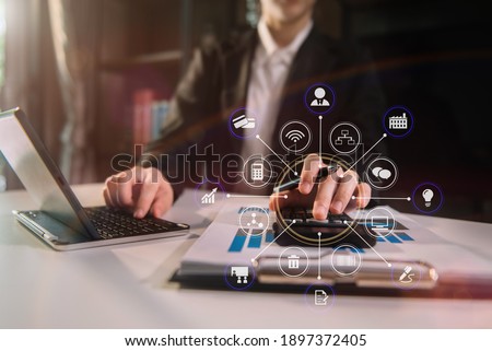 Business women and financial concepts about office work. Analysts discuss business with a calculator as a tool. Royalty-Free Stock Photo #1897372405