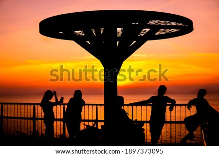 Silhouette of people relaxing for background