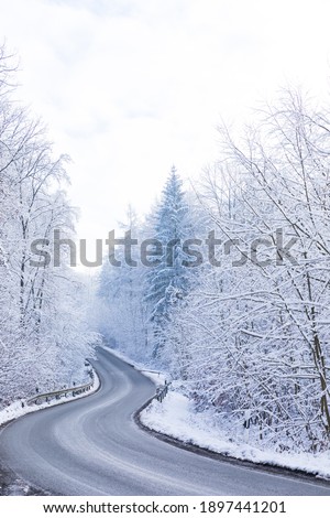 Symbolic picture of a road in winter