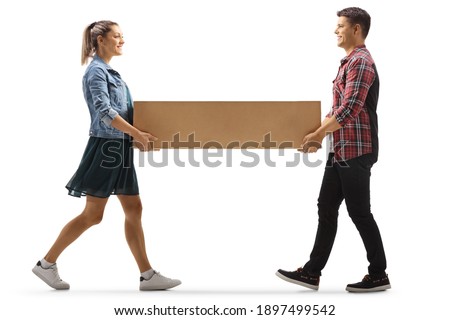 Young man and woman carrying a cardboard box isolated on white background