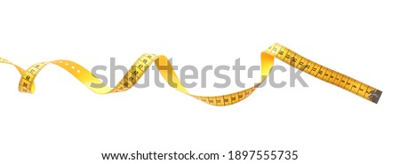 New yellow measuring tape isolated on white, top view Royalty-Free Stock Photo #1897555735