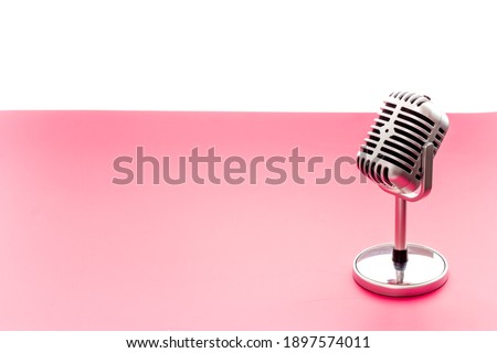 Retro style microphone. Aydio recording background