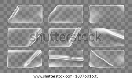 Transparent glued crumpled rectangle stickers with curled corners mock up set. Blank adhesive transparent paper or plastic sticker label with curled and wrinkled effect. 3d realistic vector icon Royalty-Free Stock Photo #1897601635