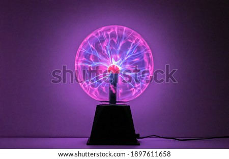 Plasma ball ray light science  Royalty-Free Stock Photo #1897611658