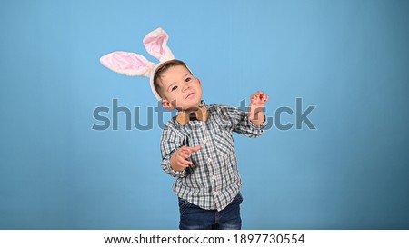 Little child with ears, on an isolated background. High quality photo