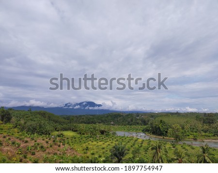 Grain picture of the scenery with mountain and river view