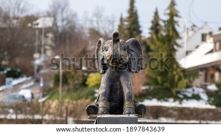 Figure of a small elephant close up