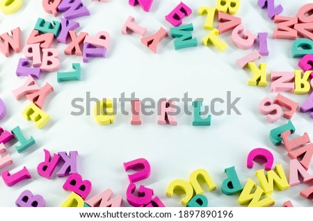 Letters on a white surface. The word "girl". Word from letters. Isolated image.
