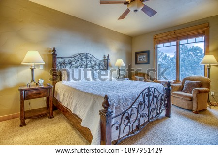 Interior guest bedroom with home decor. Royalty-Free Stock Photo #1897951429