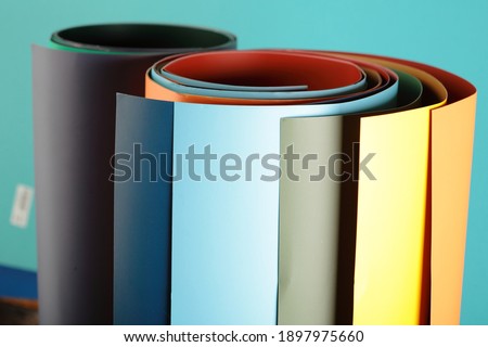 Rolls of color paper. Paper backdrops on a roll.