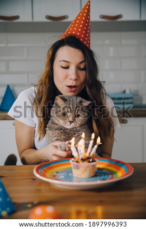 happy birhtday british cat with woman in hat