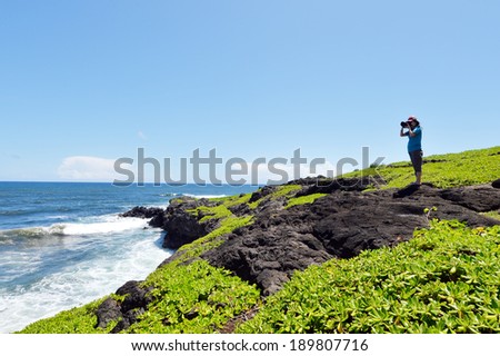 Nature Photographer taking pictures outdoors,maui,hawaii.